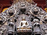 Kathmandu Patan Golden Temple 05 Buddha On Torana Above Inside Entrance Door 